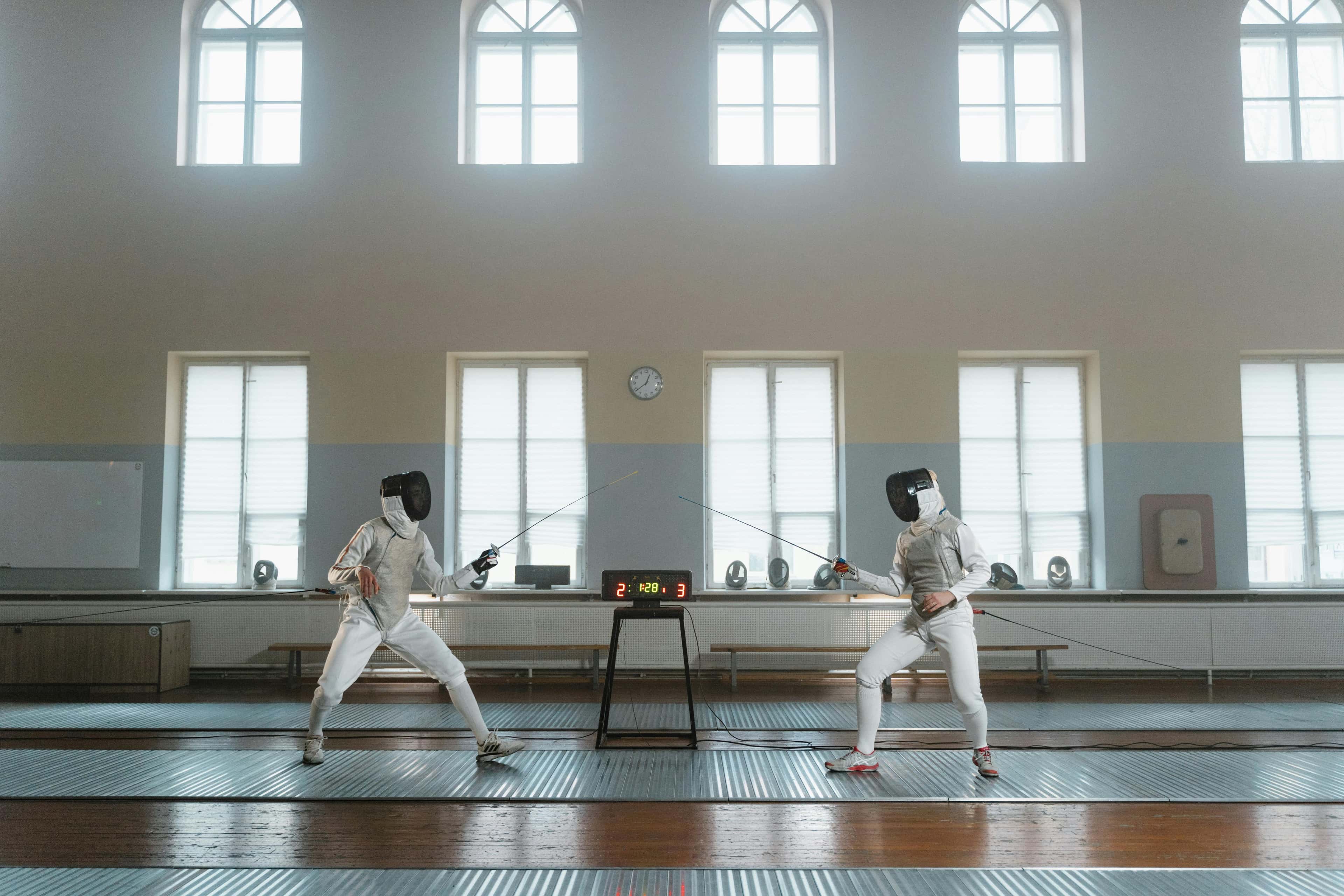 Custom fencing socks category cover image showing athletes in action during training