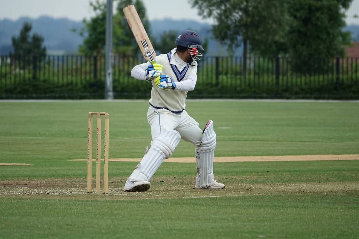 Cricket player in action with custom sports socks