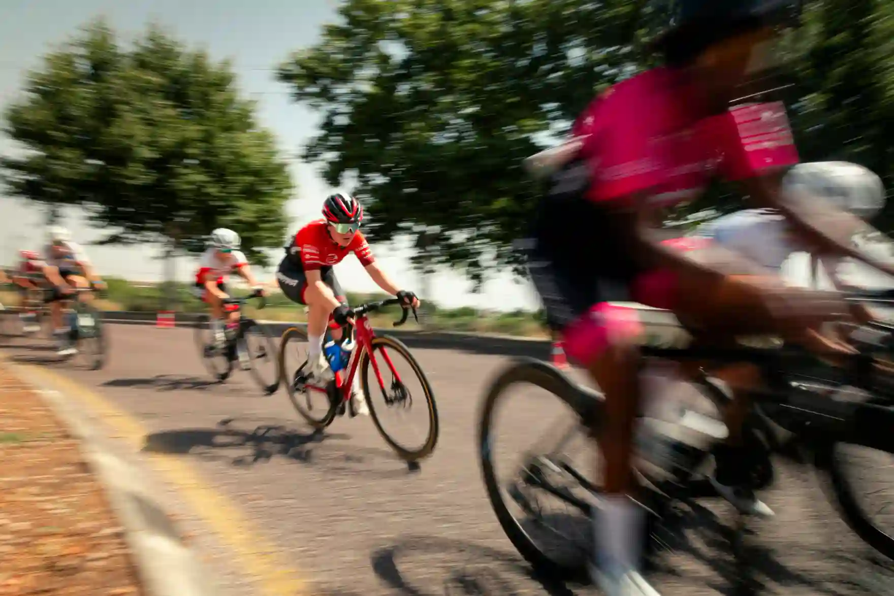 Pack of cyclists in motion