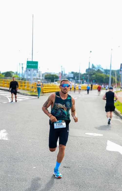 City marathon runner wearing blue performance socks